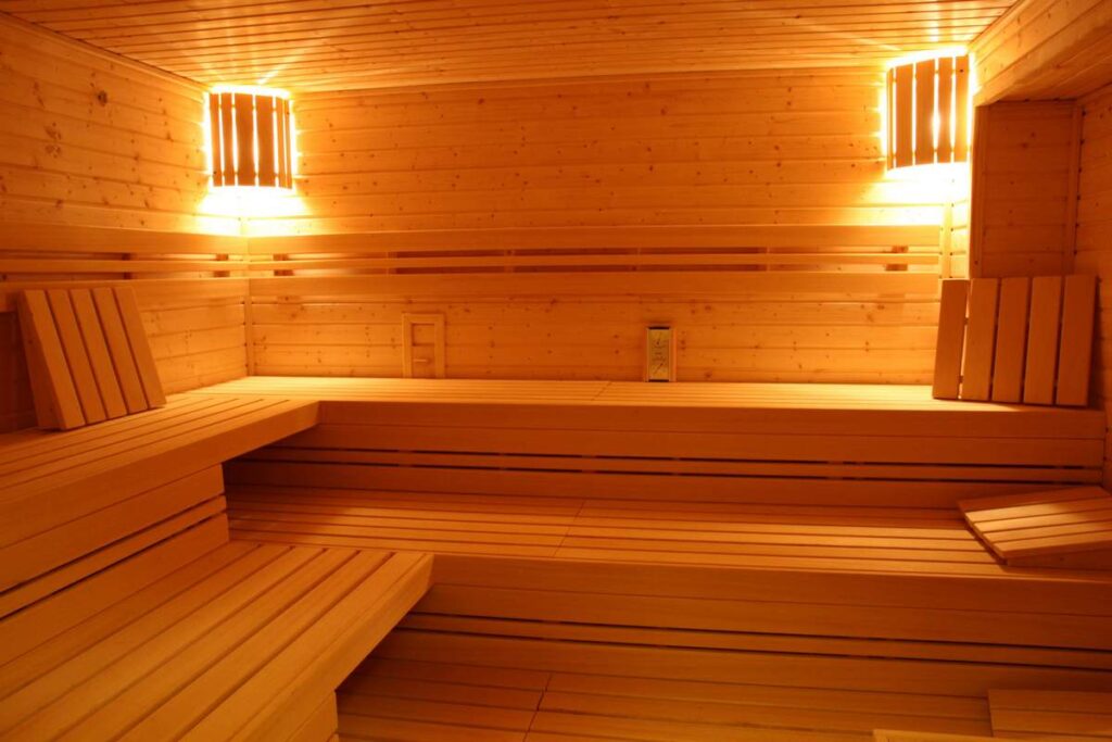 Home Sauna Installation Toronto custom indoor sauna build with wood benches and heater